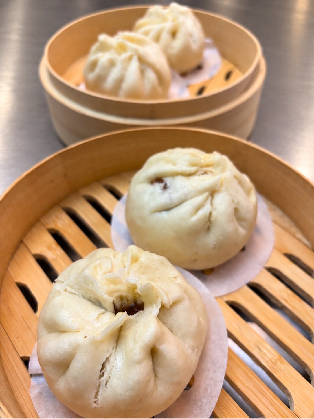 Freshly steamed handmade char siu bao at WOKTOPIA Cooking Class